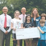 David Evangelisti, Dan Taylor-Stypa and Denise D'Avella gratefully accept a check from Essex Elementary School students David Evangelisti, Dan Taylor-Stypa and Denise D'Avella gratefully accept a check from Essex Elementary School students