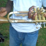 Trumpet held together by tape and glue