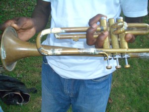 Trumpet held together by tape and glue