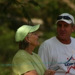 Jenifer Grant and John DeLong confer on the court.