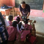 Children eager to view the videos!